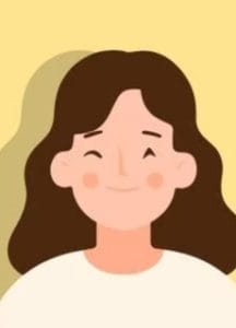 Smiling woman with shoulder-length brown hair and a white top against a pale yellow background.